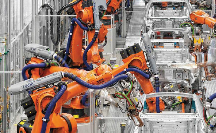 Robots working in an assembly line